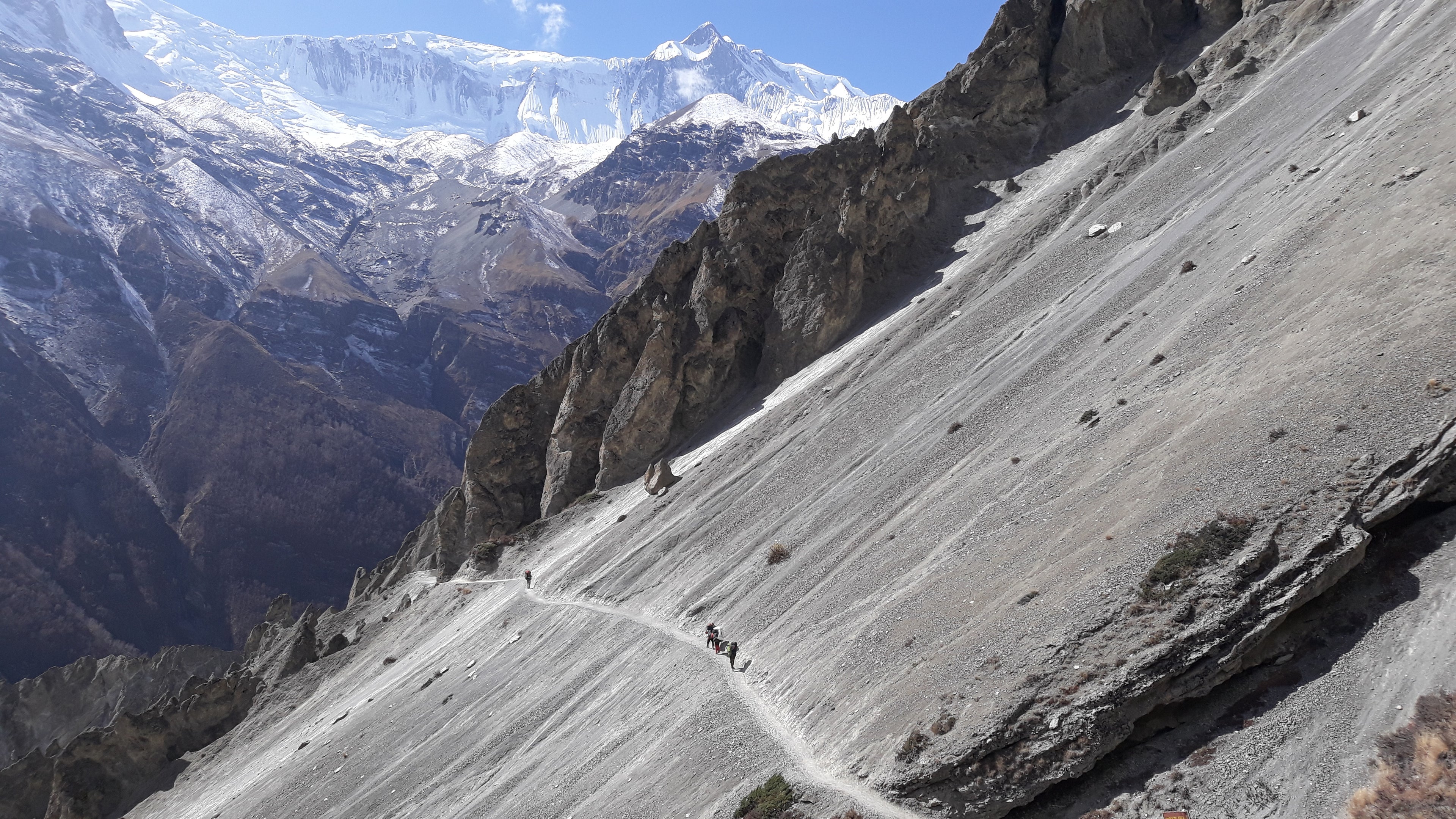Hikers on Side of Mountain background image
